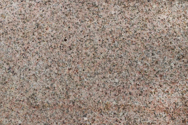 Mermer doku. Arka palyned plakadır. Taştan yapılmış bir ürün. Küçük taş parçaları. Işığı yansıtan bir parlak parlaklık düz yüzeyle. Yumuşak sıcak tatlı sesi. Turuncu renk.