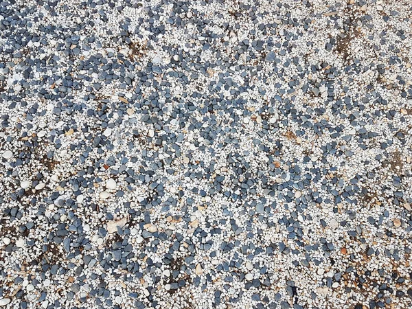 灰荫下的细卵石 海滩地面 用于设计 装饰和施工的天然材料 砂纸花岗岩和坚硬矿物 地质学和矿产 — 图库照片
