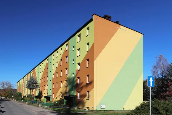 Yaslo, Poland - oct 13 2018: Small residential apartment building in Eastern Europe. The exterior painting design of the restored home from the working quarter. Color scale elevation of the building.