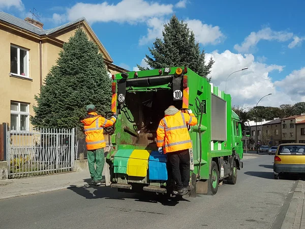 Collection and transportation of domestic garbage by municipal service employees. Control of the ecological situation in cities. Utilization of human waste. Limited speed. Territory cleaning