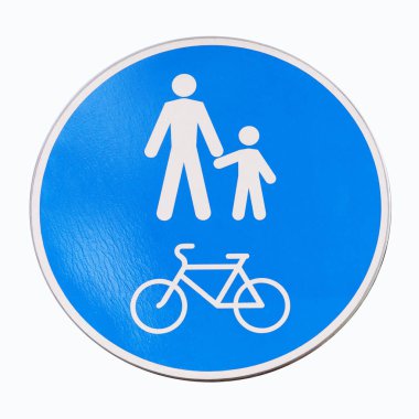 Yuvarlak şekilli yol işaretidir bir yaya ve bisiklet bölgesi. Beyaz insanlar işareti ve mavi bir arka plan üzerinde bisiklet. Yol ve trafik güvenliği. Kentsel alanlarda sembollerin. Beyaz arka plan üzerinde izole