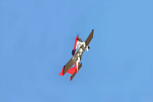 Yaslo, Poland - 9 3 2019: A light sport turboprop aircraft flies across the sky among the rainy clouds. Landing in difficult weather conditions. Meteorology and weather forecast for aviation — Stock Photo, Image