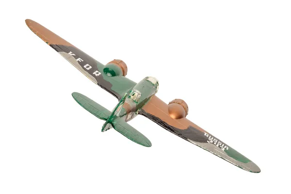 Beyaz arka plan üzerinde izole kahverengi plastik uçak — Stok fotoğraf