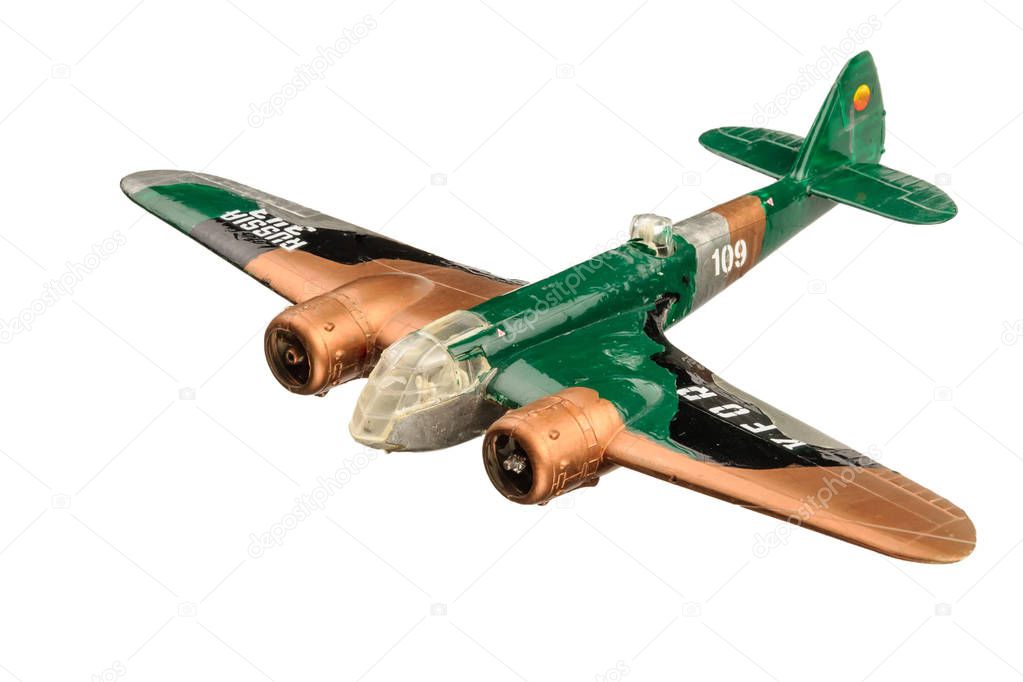 Brown plastic plane isolated on the white background