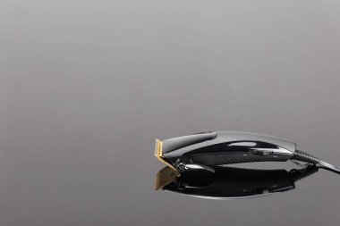 Saç berber Clippers, gri ayna BAC üzerinde saç kesimi aksesuarları