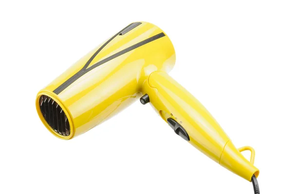 Secador de pelo plegable amarillo aislado en el fondo blanco —  Fotos de Stock