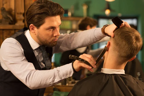 Young Handsome Bearded Professional Barber Shaving His Male Client Razor — Stock Photo, Image