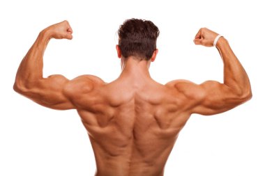 Pazı esneme kasları gösterilen bir erkek vücut geliştirmeci kadeh görünümü arka ve izole geri. Atletik gömleksiz adam güçlü bir şekilde poz. Fitness adam güçlü vücut nefes kesici. Sağlık, fitness kavramı