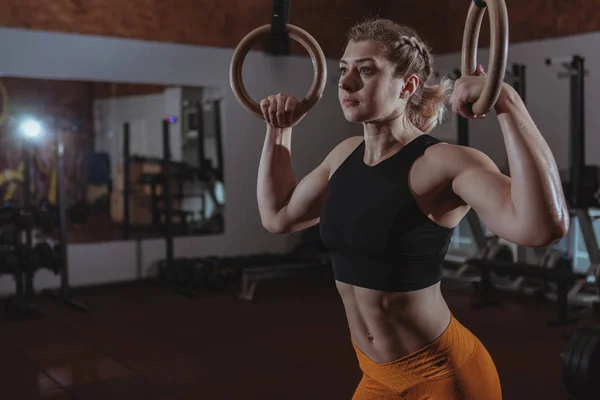 Female crossfit athlete working out
