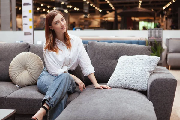 Charming Woman Sitting New Couch Furniture Store — Stock Photo, Image