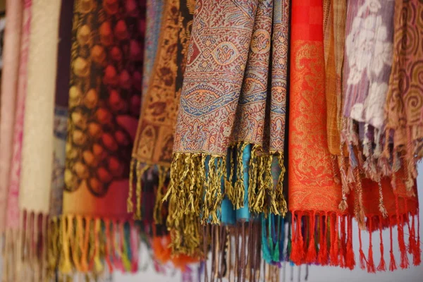 Traditional handmade clothes on market