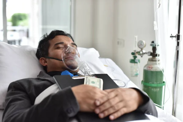 Businessmen are also working and making money while they sleep in bed in the hospital.Business Concepts