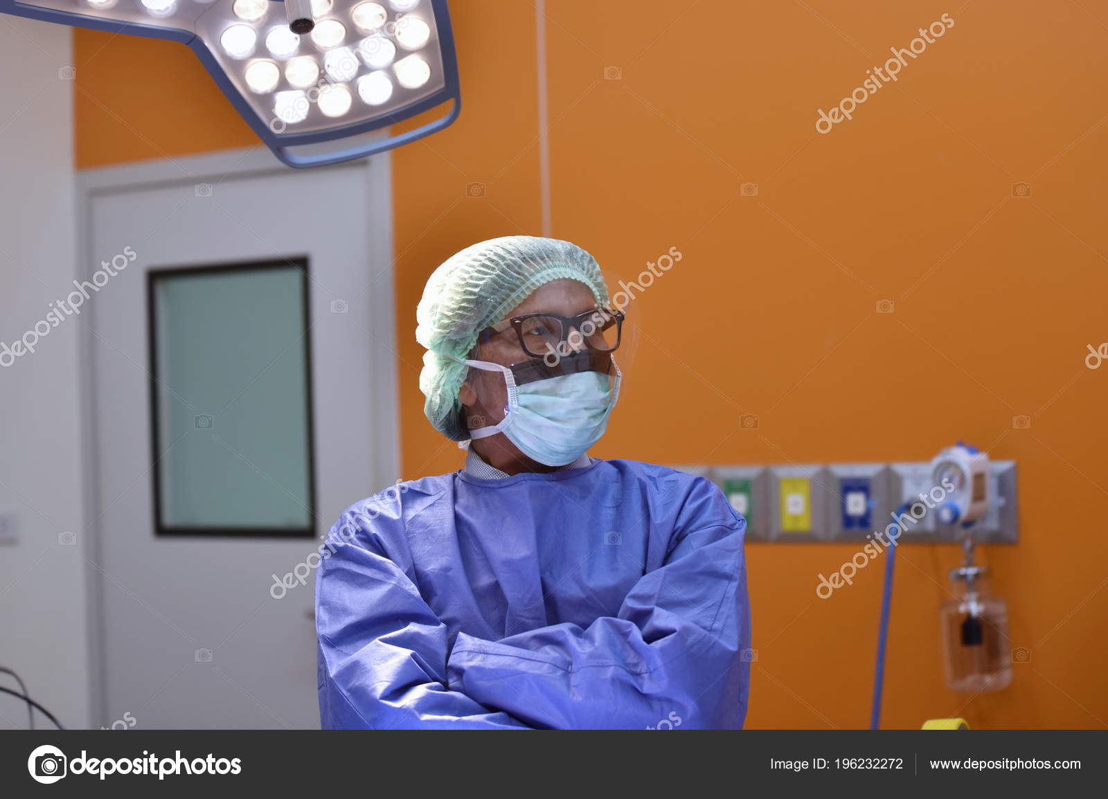 Operating Room Scrub Nurse Preparing Medical Instruments