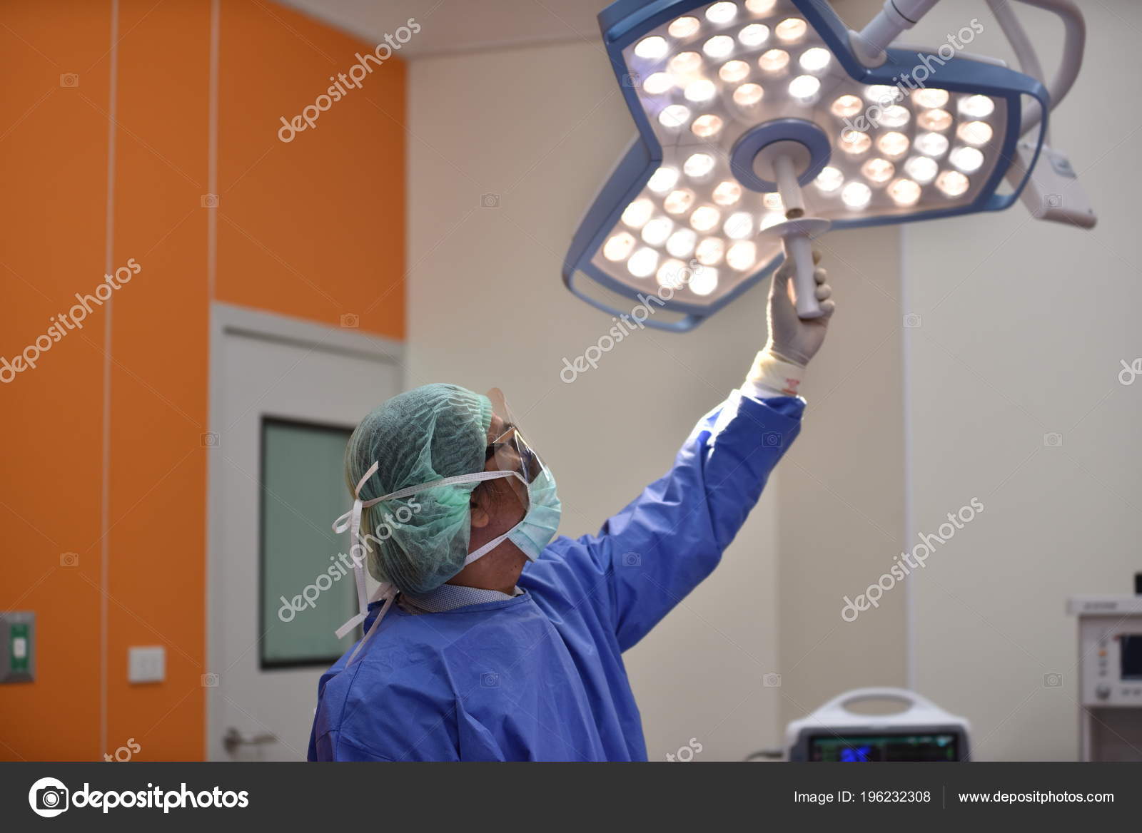 Operating Room Scrub Nurse Preparing Medical Instruments