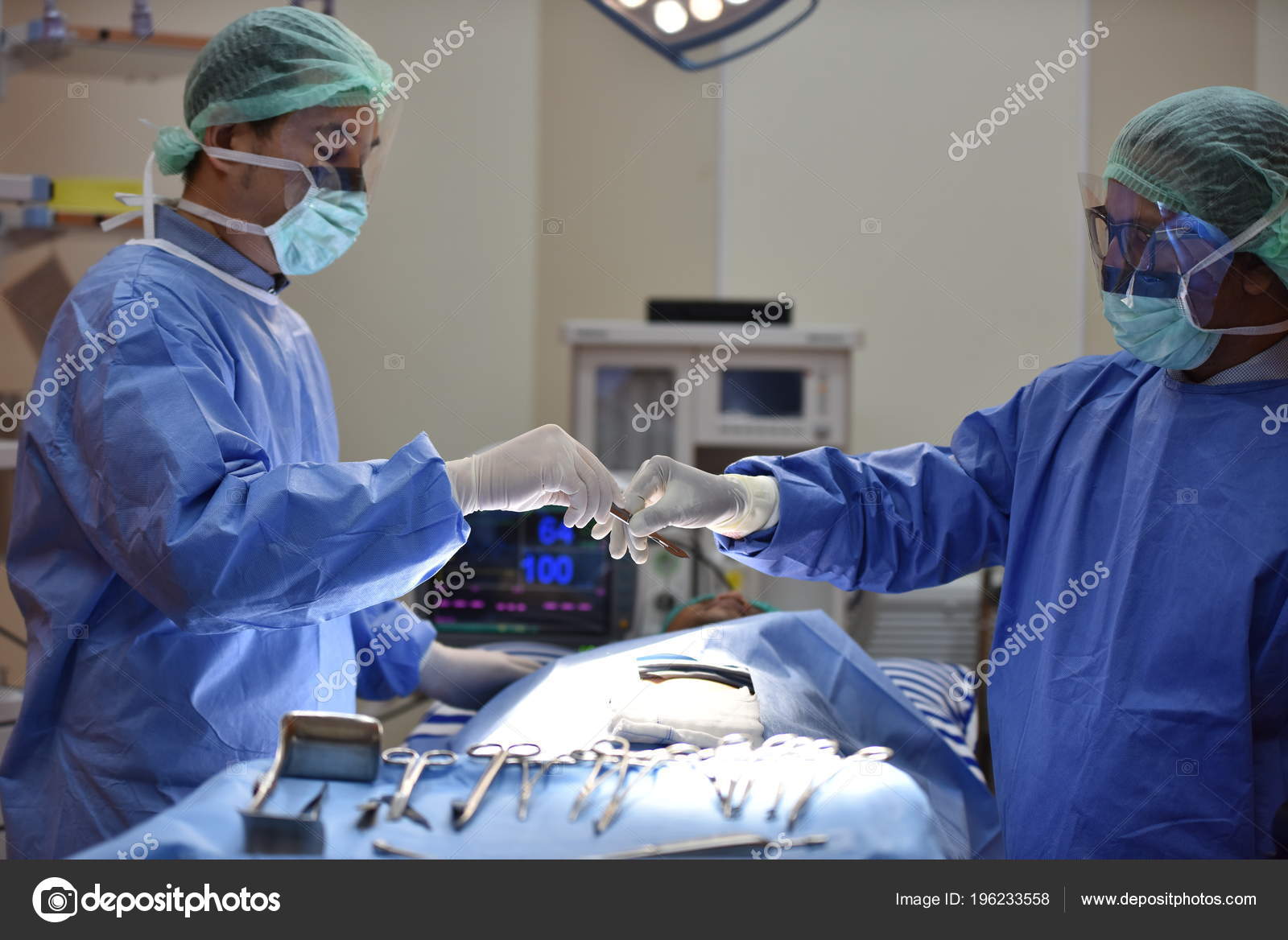 Operating Room Scrub Nurse Preparing Medical Instruments