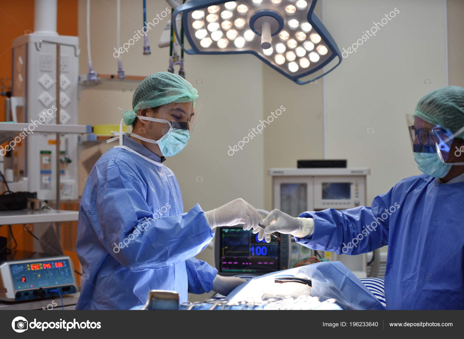 Operating Room Scrub Nurse Preparing Medical Instruments