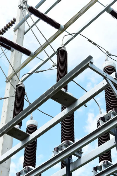 High voltage transmission line.high voltage pole Power transmission system With sky background image. High-voltage tower at blue sky background