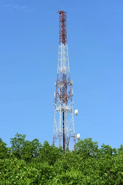 Microwave system.Wireless Communication Antenna With bright sky.Telecommunication tower with antennas with blue sky.