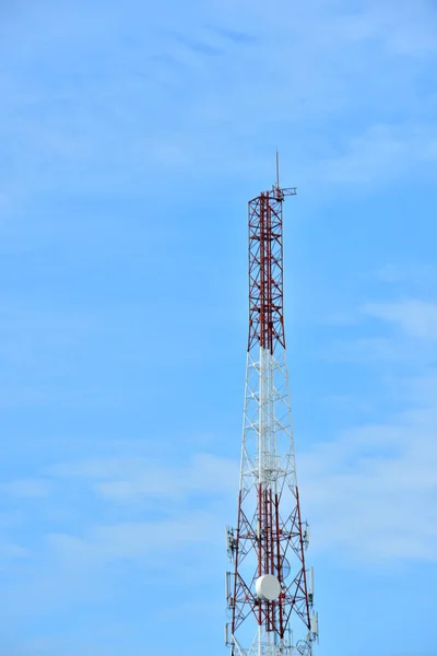 Wireless Communication Antenna With bright sky.Telecommunication tower with antennas with blue sky.