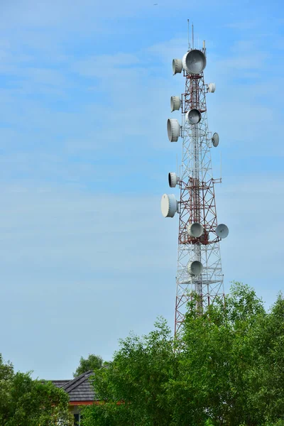 Wireless Communication Antenna With bright sky.Telecommunication tower with antennas with blue sky.