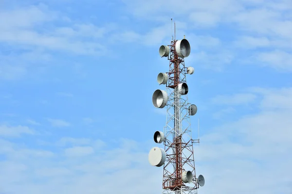 Wireless Communication Antenna With bright sky.Telecommunication tower with antennas with blue sky.