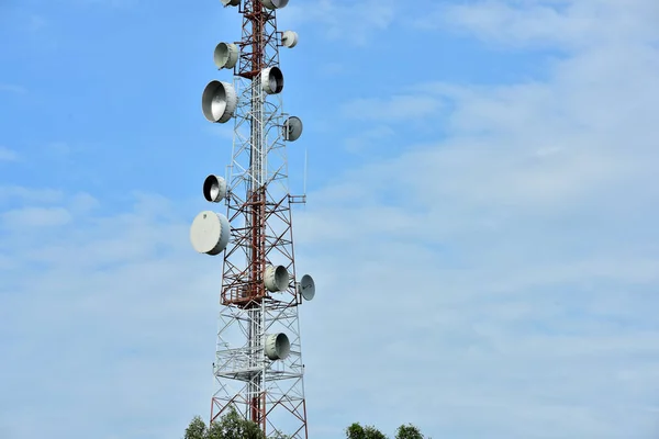 Wireless Communication Antenna With bright sky.Telecommunication tower with antennas with blue sky.