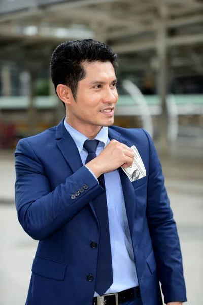 Asian Businessman Throwing Money Pocket Suit — Stock Photo, Image