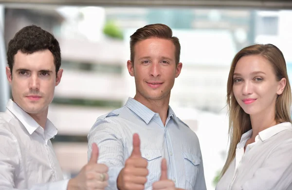 Caucasian Business People Showing Thumbs — Stock Photo, Image