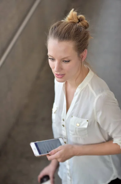 Caucasian woman using mobil phone