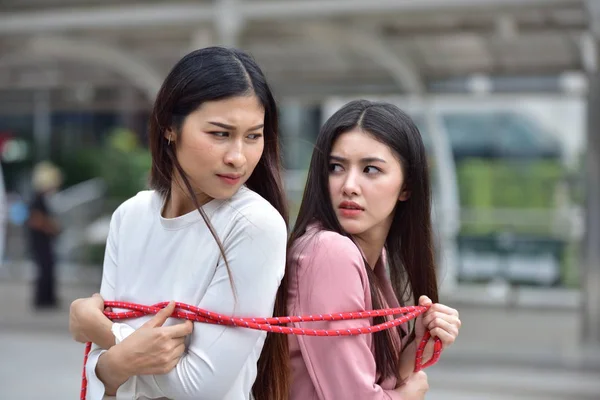 Asian women tied with a rope