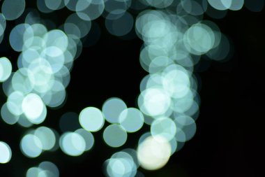 Soyut Mavi bulanık ve gümüş pırıltılı Parlatıcı ampul arka plan: bulanıklık Noel duvar kağıdı dekorasyon concept.christmas ışık gece, soyut dairesel bokeh background.bokeh ışıklar ışıklar .