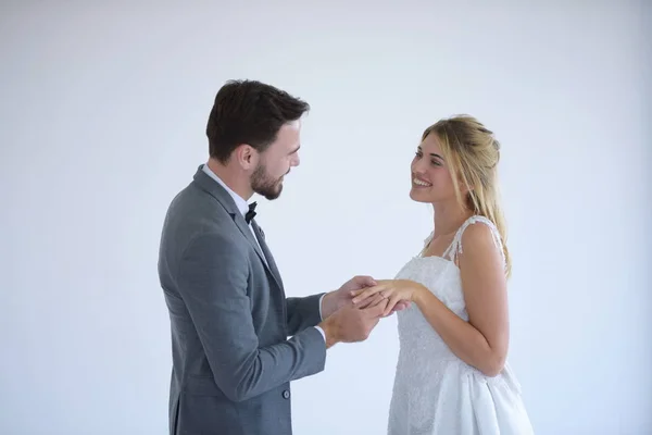 Couples who are getting married are happy when they try to get married at the studio.