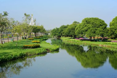 çeşitli renk ve çeşitleri Suanluang Rama 9, Asya Thailandflower ve ağacı bahçeleri genel Park'ta. Güzel bir kamu park alanı Suan Luang R.9 Bangkok Tayland, yansıma Köşk ve ağaç güzel gün batımı.