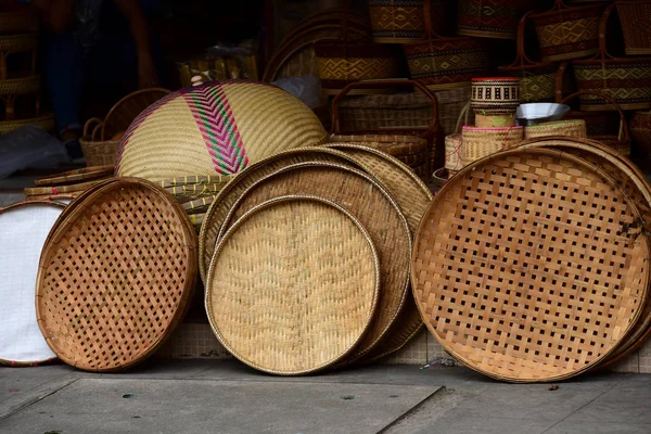 Rattan or bamboo handicraft hand made from natural straw basket.Basket wicker is Thai handmade. it is woven bamboo texture for background and design.Traditional Thai woven straw texture