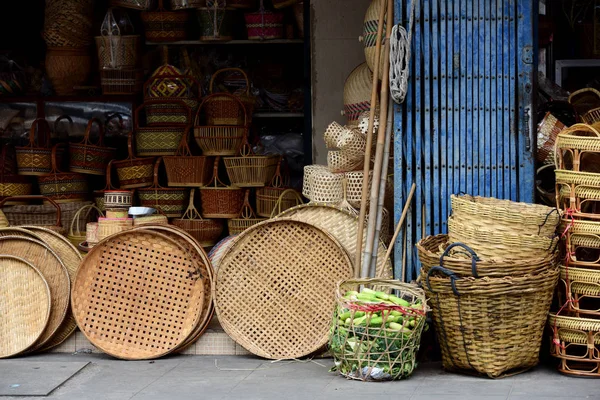 Rattan or bamboo handicraft hand made from natural straw basket.Basket wicker is Thai handmade. it is woven bamboo texture for background and design.Traditional Thai woven straw texture