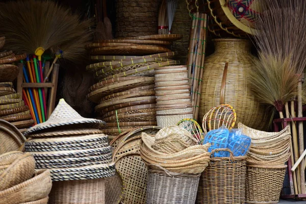 Rattan or bamboo handicraft hand made from natural straw basket.Basket wicker is Thai handmade. it is woven bamboo texture for background and design.Traditional Thai woven straw texture