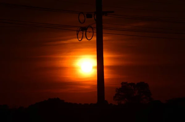 Elektriciteit Post Silhouet Zonsondergang Achtergrond — Stockfoto
