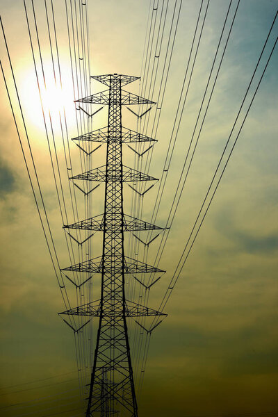 High voltage electrical poles, electric power transmission system With the sun shining