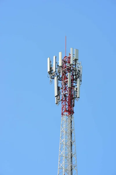 Wireless Communication Antenna With bright sky.Telecommunication tower with antennas.