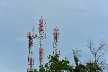 scenic view of blue sky with electric towers