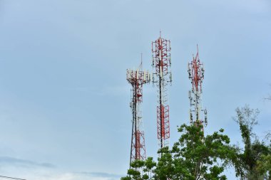 scenic view of blue sky with electric towers