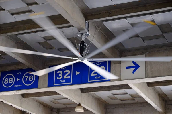 Fan on ceiling in concrete building