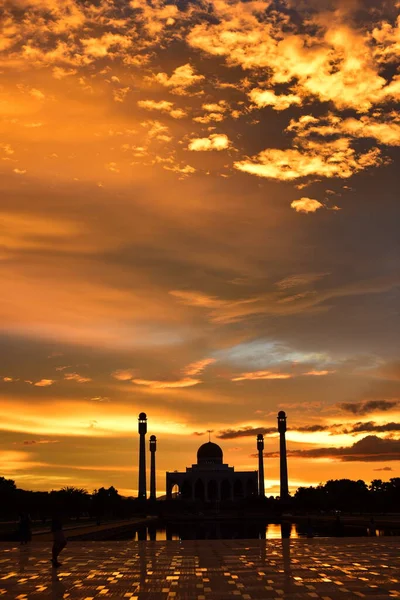 Sunset view with beautiful golden sky At Masjid in the middle of Songkhla Province, the colorful sky lights in the evening