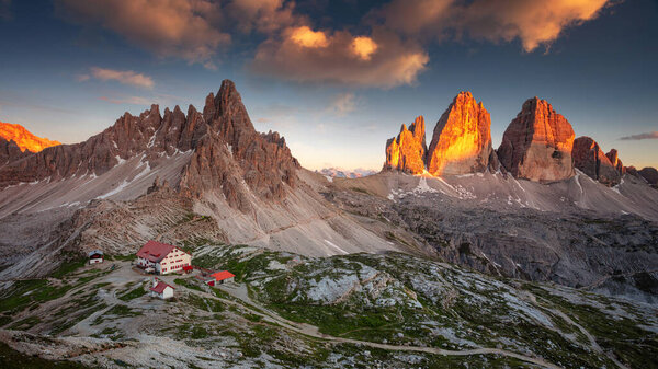 The Three Peaks of Lavaredo. Amazing panorama of Italian  Dolomites with famous Three Peaks of Lavaredo (Tre Cime di Lavaredo) South Tyrol, Italy, Europe at summer sunset.