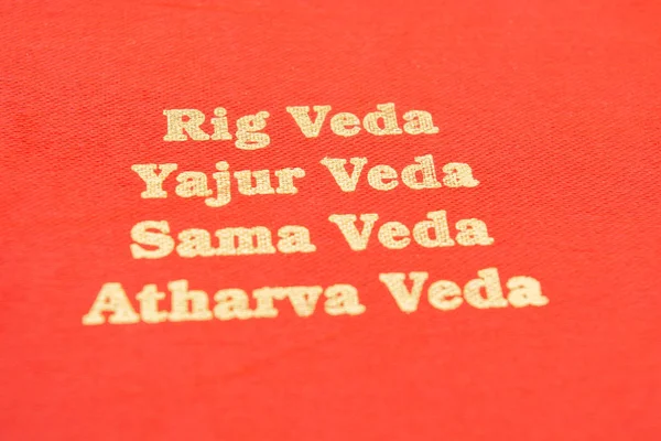 Maski,Karnataka,India - March 13,2019 :The Four types of Holy Vedas printed on red textured paper — Stock Photo, Image