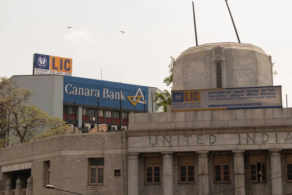 Bangalore, Karnataka India-June 04 2019 : LIC or life insurance corporation of India and Canara bank billboard on top the building at bengaluru,India — Stock Photo, Image