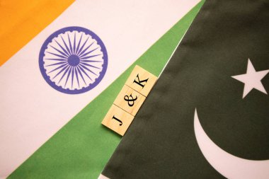 India Pakistan flags with J and k written in scrabble letters on the flag clipart