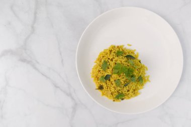 Güney Hint kahvaltı Puffed pirinç upma onun uggani, vaggani, borugulu, buggani, borugula upma Hindistan Staates bağlıdır denilen birçok isim vardır.