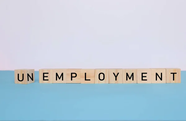 Concepto de empleo - Desempleo en letras de madera —  Fotos de Stock