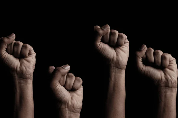 Concept against racism or racial discrimination by showing with hand gestures fist or solidarity — Stock Photo, Image